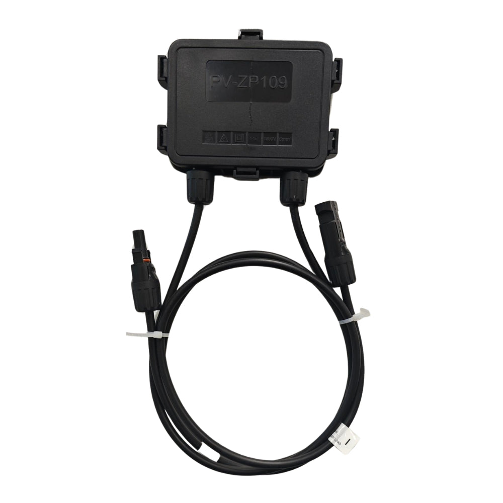 Black electronic device with cables on a white background